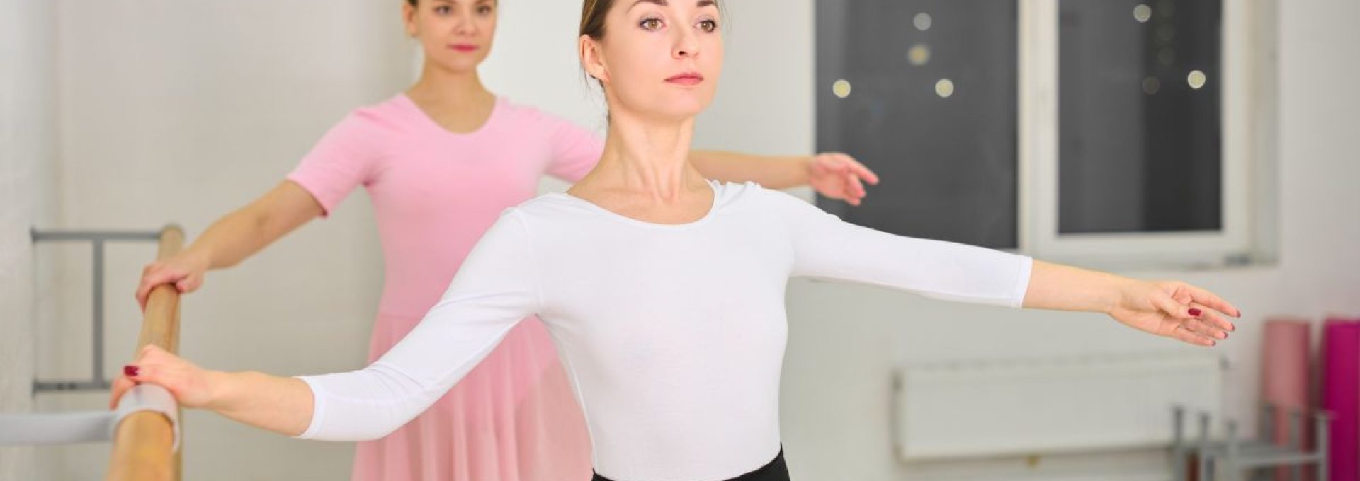 Young,Caucasian,Females,With,Brown,Hair,Gracefully,Practice,Ballet,At
